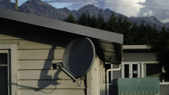 Timelapse in Queenstown of the analogue antenna with a background of clouds over the mountains