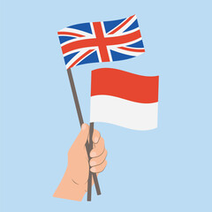Flags of UK and Monaco, Hand Holding flags