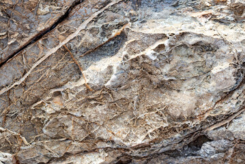 Background of stone wall texture. Close-up of stone surface.