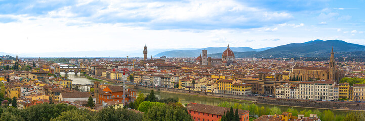 Fototapeta premium Firenze city skyline, buildings, and beautiful panorama landscape with the Arno River, Metropolitan City of Florence, the capital of Tuscany region, Italy