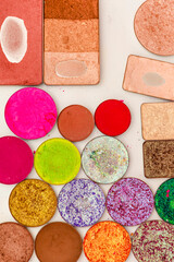 Line of Variety of Professional Makeup Tools and Brushes With Eye shadows Placed in Workshop of Makeup Artist