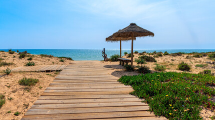 Fototapeta premium Wooden path to the sea- travel, relax,vacation,summer holiday concept- Portugal