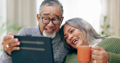 Senior happy couple, tablet and couch in home for video, meme or social network app for laughing with love. Old man, woman and relax with mobile touchscreen, funny movie and retirement in living room