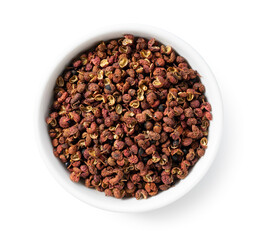 Sichuan pepper in a white bowl set against a white background.