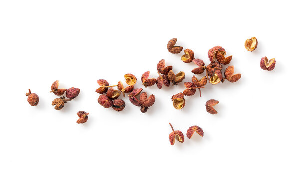 Sichuan pepper placed on a white background.
