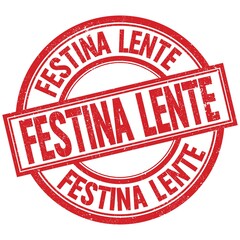 FESTINA LENTE written word on red stamp sign