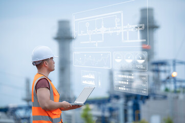 Two engineer working at power plant,Work together happily,Help each other analyze the...