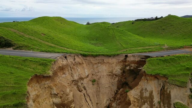 Landslide causes collapsed road after cyclone in New Zealand