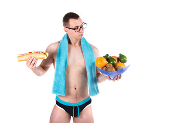 Sports and diet. Attractive man and healthy lifestyle. White background.