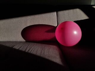 Pink plastic balloon