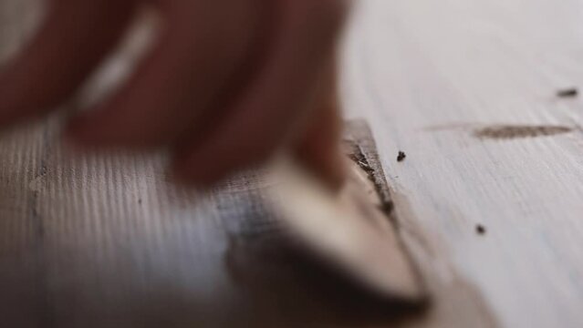 Macro shot of the floor tile grouting process. Cosmetic step in the tiling process.