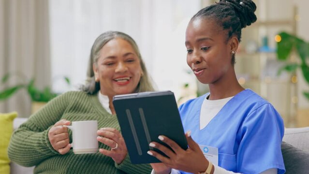 Nurse, caretaker and elderly woman talk with tablet and communication for teaching about tech. Retirement home, healthcare worker and nursing employee talking to senior about an online app on a sofa