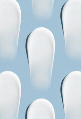 pattern cosmetic smears cream texture on blue background