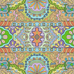 Hand drawn seamless graphic pattern, colorful artistic background with floral and geometric elements. Doodle ethnic mandala ornament for textile fabric, paper print. Surface texture 