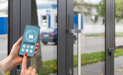 Woman unlocking smartphone application on the screen, closeup. Space for text