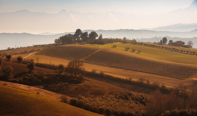 Countryside landscape in autumn, agricultural fields among hills