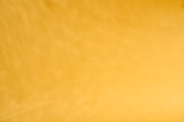 Obraz premium Yellow paper background with shadow texture. Sunny summer background with copyspace