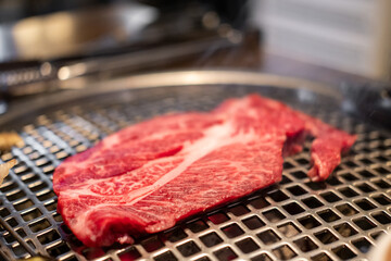 Korean Style Barbecue Grill BBQ rare meat with soft focus