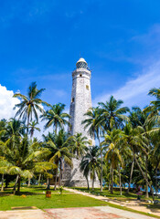 Fototapeta premium Beautiful colonial old huge lighthouse. Photography for tourism background, design and advertising.