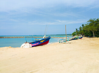 Beautiful tropical landscape with colorful fishing village boats.  Photography for tourism background, design and advertising. 10 January 2023, Sooriya, Sri Lanka