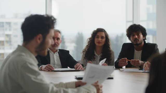Businessmen hold a meeting of the board of directors, which discusses the need for restructuring the business processes of the enterprise. Business partners share ideas to improve the company's