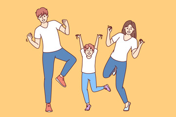 Rejoicing dad, mom and little boy dance and celebrate victory young family competition or winning lottery. Positive family dancing energetically at disco enjoying cheerful atmosphere and good music 