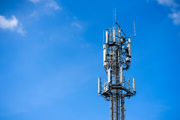 cell phone tower on blue sky
