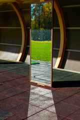 Mirror on Driving Range on Golf Course in a Sunny Day in Switzerland.
