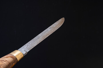 Damascus steel knives on a black background. Kitchen knives. background with japanese knife. A set of Japanese Damascus steel knives. Banner