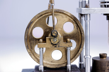 Obraz premium closeup of a stirling engine construction isolated on white