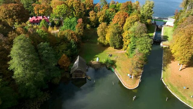 AUGUSTOW, POLAND - OCTOBER, 2022: Aerial view of the Augustow Canal and Lake Necko on an autumn ,sunny day.