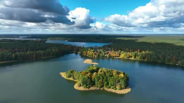 AUGUSTOW, POLAND - OCTOBER, 2022: Aerial view of the Augustow Canal and Lake Necko on an autumn ,sunny day.