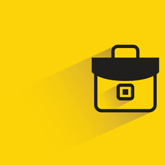 briefcase with shadow on yellow background
