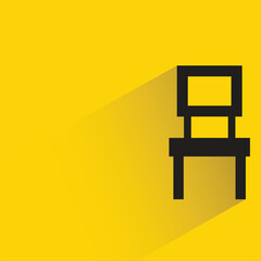 chair with shadow on yellow background