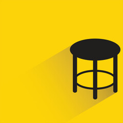 chair with shadow on yellow background