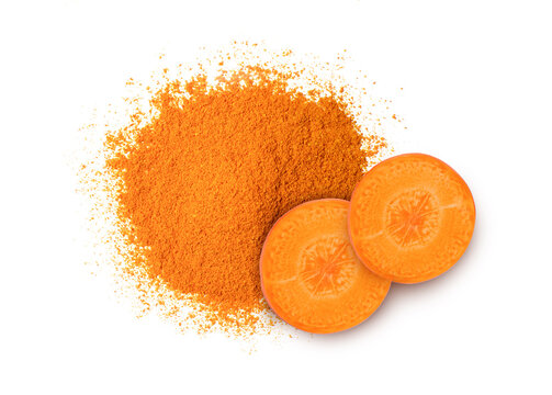 Carrot powder and fresh carrot slices isolated on white background. Top view. Flat lay.
