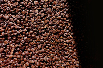 Roasted coffee beans background, Top view of brown coffee beans, Texture freshly roasted coffee beans. - 592228869