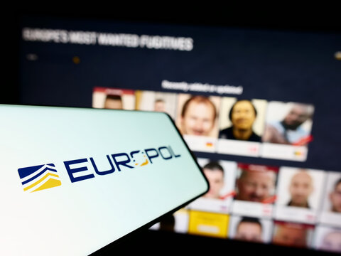 Stuttgart, Germany - 04-02-2023: Cellphone with logo of EU law enforcement agency Europol on screen in front of website. Focus on left of phone display.