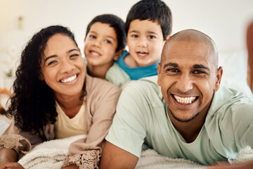Fototapeta premium Happy family selfie, bedroom portrait and relax mother, father and children bonding, home and enjoy time together. Happiness, morning love or face of smiling mom, dad and kids on bed for memory photo