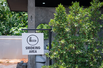 Designated smoking area in outdoor garden. Place of separate from smoker and non-smoker zone.