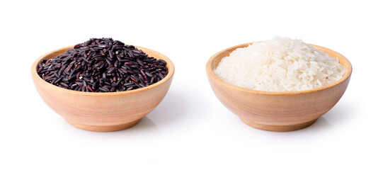 Black rice and white rice in wooden bowl isolated on white background. 