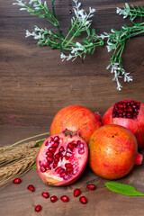 Fresh Pomegranate rich in natural antioxidants. Concept of red fruits, vitamins and natural antioxidants to the skin for beauty.