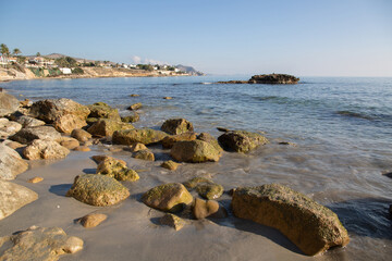 Seascape View of Rock at Almadrava Beach; El Campello; Alicante; Spain - 592233271