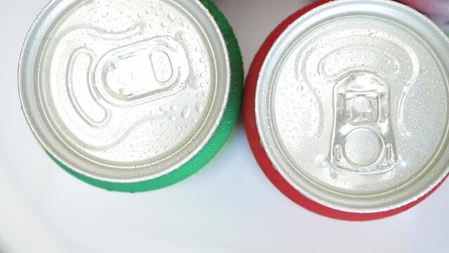 Various Cold, Sweet, and Carbonated Refreshing Drinks. Shooting with Refreshing Pop Can Drinks.