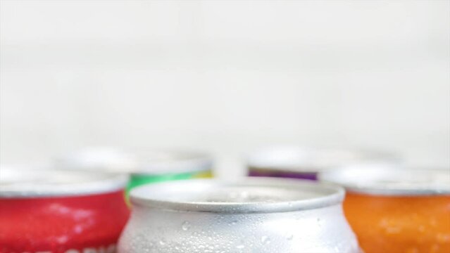 Shooting with Refreshing Pop Can Drinks. Various Cold, Sweet, and Carbonated Refreshing Drinks. 