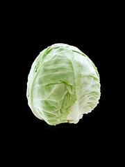 Fototapeta premium Closeup of a cabbage on a black background
