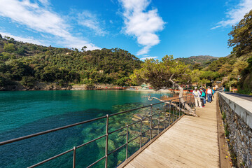 Fototapeta premium Bay and beach of Paraggi near the Portofino village. Tourist resort in Genoa Province (Genova), Liguria, Italy, Europe. Coast and Mediterranean Sea (Ligurian Sea).