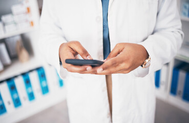 Pharmacist, phone or hands of person texting in pharmacy to contact, email communication or reading chat. Social media or doctor on mobile app, typing or searching medical news on internet at work