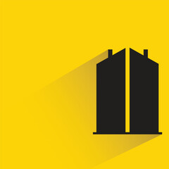 silhouette city building with shadow on yellow background