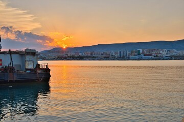 Scenic shot of boats and a waterscape during sunset in Manfredonia Italy
